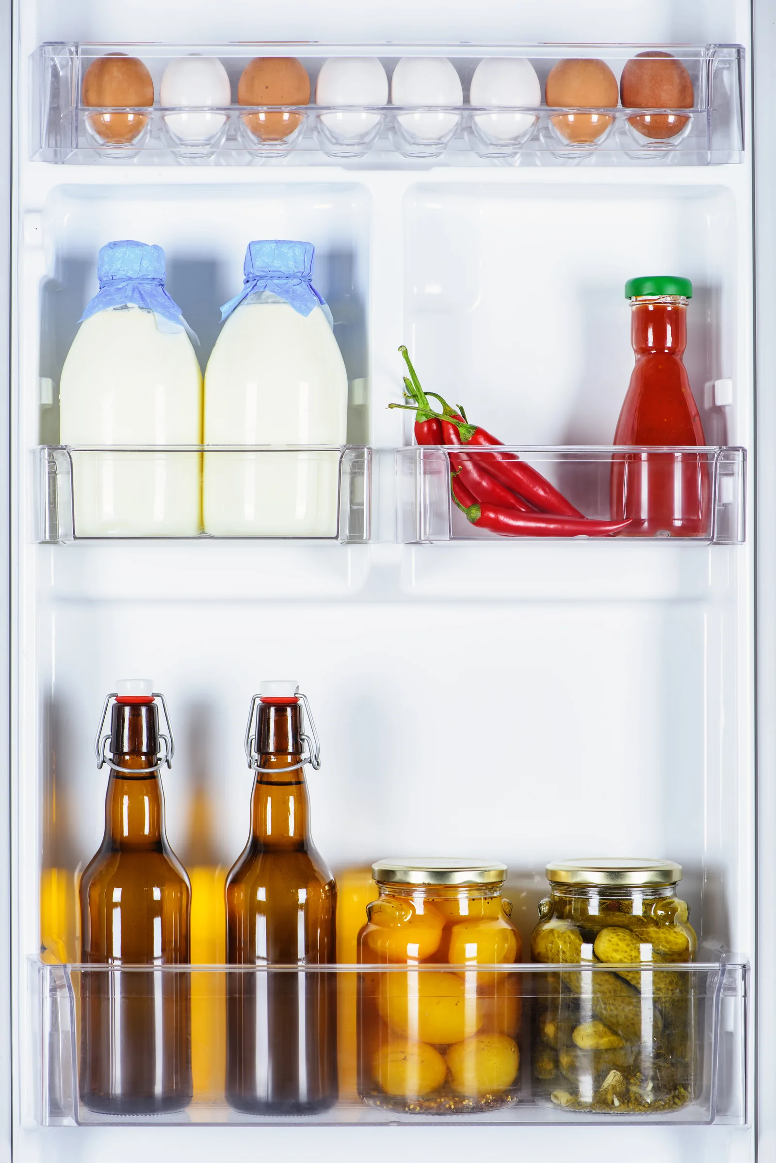 Chilled drinks and fresh food inside a fridge running at the correct temperature